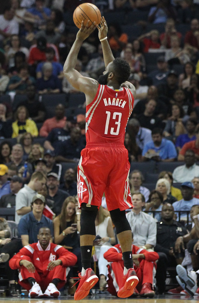 Oct 6, 2015; Memphis, TN, USA; Houston Rockets guard James Harden (13) attempts a three point shot against the Memphis Grizzlies at FedExForum. Memphis defeated Houston 92-89. Mandatory Credit: Nelson Chenault-USA TODAY Sports